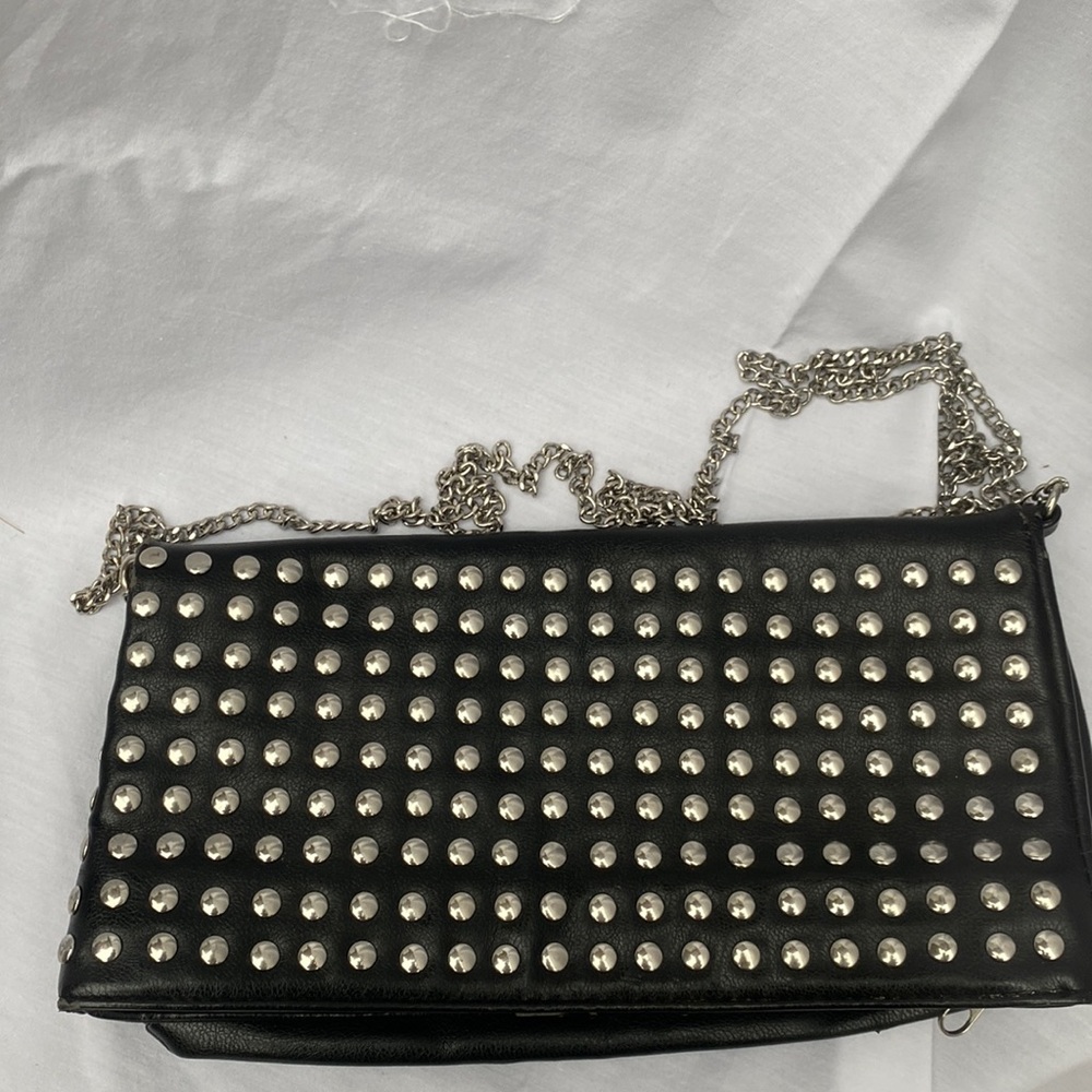 Black purse from H&M. Silver chain. Great condition